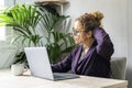 Busy elegant manager woman touching her hair and thinking on job problems. Concept of businesswoman lifestyle. Home office