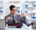 Busy employee chained to his office desk Royalty Free Stock Photo