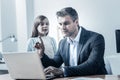 Busy father ignoring his adorable little daughter Royalty Free Stock Photo