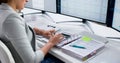 Busy Female Accountant Using Multiple Screens Royalty Free Stock Photo