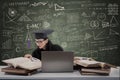 Busy female graduate reading books at class