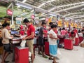 Busy grocery checkout lane