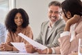 Busy happy smiling senior business man having conversation at office meeting. Royalty Free Stock Photo