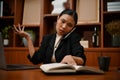 Busy and hard working businesswoman dealing her business on the phone Royalty Free Stock Photo