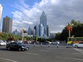 Busy highway in downtown ÃÅrÃÂ¼mqi, with city skyline seen in the background Royalty Free Stock Photo