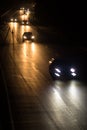 Busy highway at night with cars