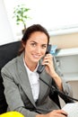 Busy hispanic female architect talking on phone Royalty Free Stock Photo