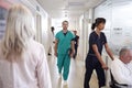 Busy Hospital Corridor With Medical Staff And Patients Royalty Free Stock Photo