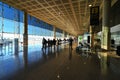 Busy interior of the El Prat airport terminal in Barcelona, Spain Royalty Free Stock Photo