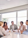 Busy international executive business team having discussion at office meeting. Royalty Free Stock Photo