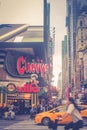 Busy intersection on the corner of 8th Avenue and West 42nd Street near Times Square in Manhattan.