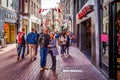 The busy Kalverstraat, a famous and touristic shopping street in the center of the old city of Amsterdam