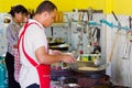 Busy kitchen of Thai restaurant