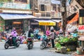 Busy local daily life of the morning street market in Hanoi, Vietnam. A busy crowd of sellers and buyers in the market. Royalty Free Stock Photo