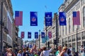 Busy London Street with American Football Banners and Flags