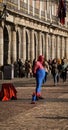 Busy Madrid plaza mayor with Spider-Man entertaining crowds Royalty Free Stock Photo