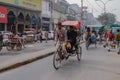 Busy Main Bazar street, the most famous market district of DelhiPaharganj. Cars, people and motorbike chaos