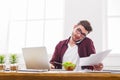 Busy man has business lunch in modern office interior Royalty Free Stock Photo