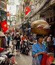 Busy market street in the Old Quarter of Hanoi, Vietnam