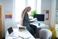 Busy Muslim teacher reading books while preparing the lesson Royalty Free Stock Photo