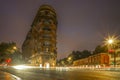 A busy road junction in the French Concession in Shanghai at night with light trails Royalty Free Stock Photo