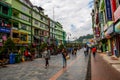 Busy road with an upscale street market of MG Marg and people walking around in Gangtok, India