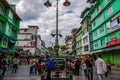 Busy road with an upscale street market of MG Marg and people walking around in Gangtok, India