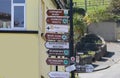 Busy Roadsign in Carlingford Village and Lough Louth Irish Sea Ireland