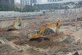 Busy running excavator At the site in SHENZHEN