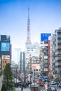 Busy salary man walk cross street and Tokyo Tower background at Hamamatsucho station Royalty Free Stock Photo