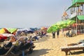 Busy sandy beach scene Goa India