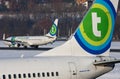 Busy scene at Innsbruck airport with two Transavia airplanes Royalty Free Stock Photo