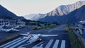 Busy scene with planes ready for take off on the runway of Tenzing-Hillary Airport, one of the most dangerous airports. Royalty Free Stock Photo