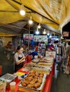 Busy scene in Taman Connaught night market in Kuala Lumpur Malaysia