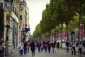 Busy shoppers along the stores of Champ Elysees in Paris