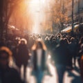 Busy street scene with crowds of people walking in the city, shopping,tourism,business people on a sunny day, blurred