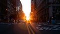 Busy street scene with people and cars at a crowded intersection on 5th Avenue in Manhattan New York City with sunset in the Royalty Free Stock Photo