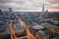 Busy streets of City of London in the dusk. First evening lights and sunset. London's panorama from the St. Paul cathedral