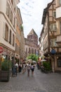 The busy streets in the historic old town of Strasbourg filled with tourists in high summer