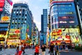 Busy streets of Shinjuku area in Tokyo, Japan in the evening Royalty Free Stock Photo