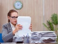 Busy stressful woman secretary under stress in the office Royalty Free Stock Photo
