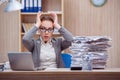 The busy stressful woman secretary under stress in the office Royalty Free Stock Photo