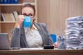 The busy stressful woman secretary under stress in the office Royalty Free Stock Photo