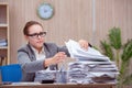 The busy stressful woman secretary under stress in the office Royalty Free Stock Photo