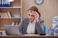 The busy stressful woman secretary under stress in the office Royalty Free Stock Photo