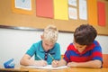 Busy students working on class work Royalty Free Stock Photo