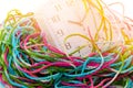 Busy time, clock is wrap with tangled yarn Royalty Free Stock Photo