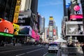 Busy Time Square with tourist and citizen in nice day seen from street Royalty Free Stock Photo