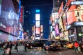 Busy Times Square at Night. Famous Toshiba New York Tower with Animated Screens in Manhattan Royalty Free Stock Photo