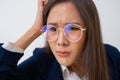 Busy and tired businesswoman eating spaghetti for lunch at the Desk office and working to deliver financial statements to a boss. Royalty Free Stock Photo